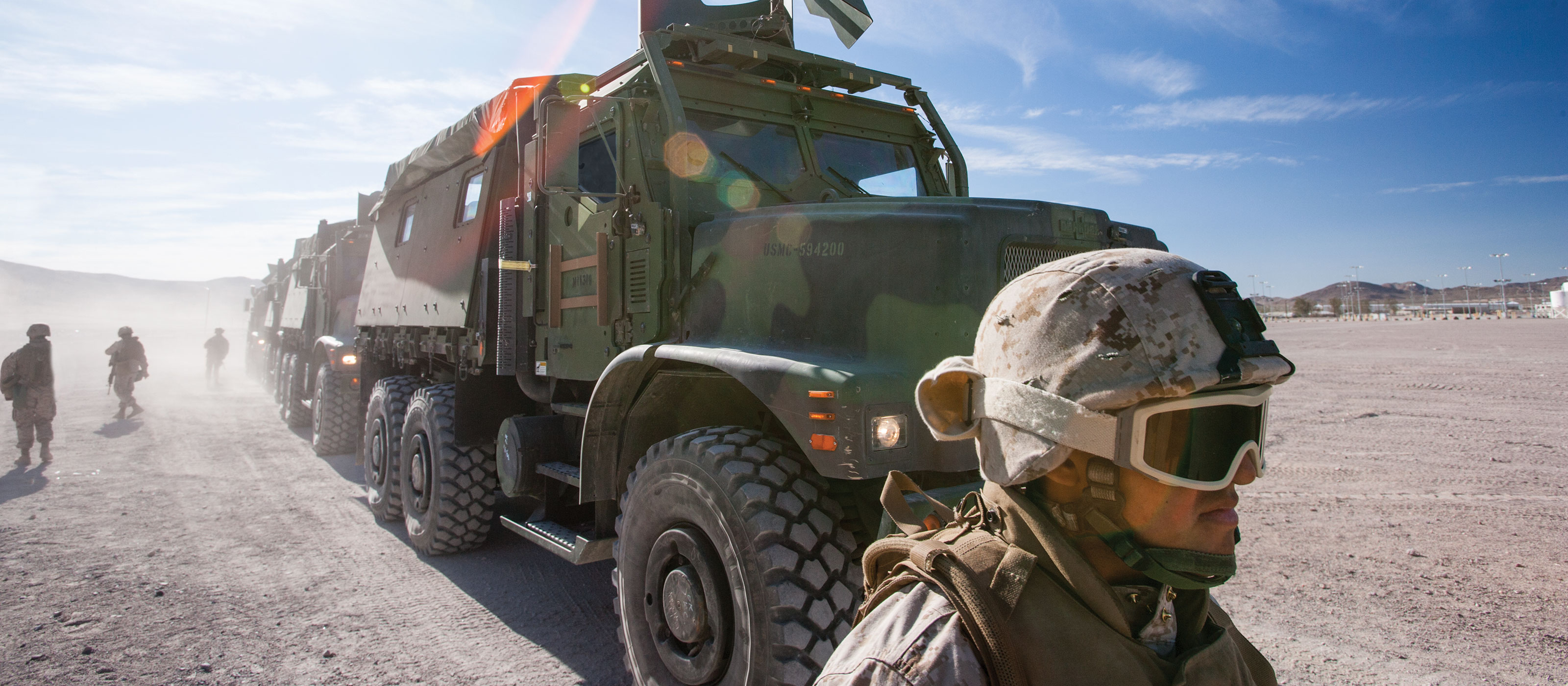 Soldier walking in front of a MTRV