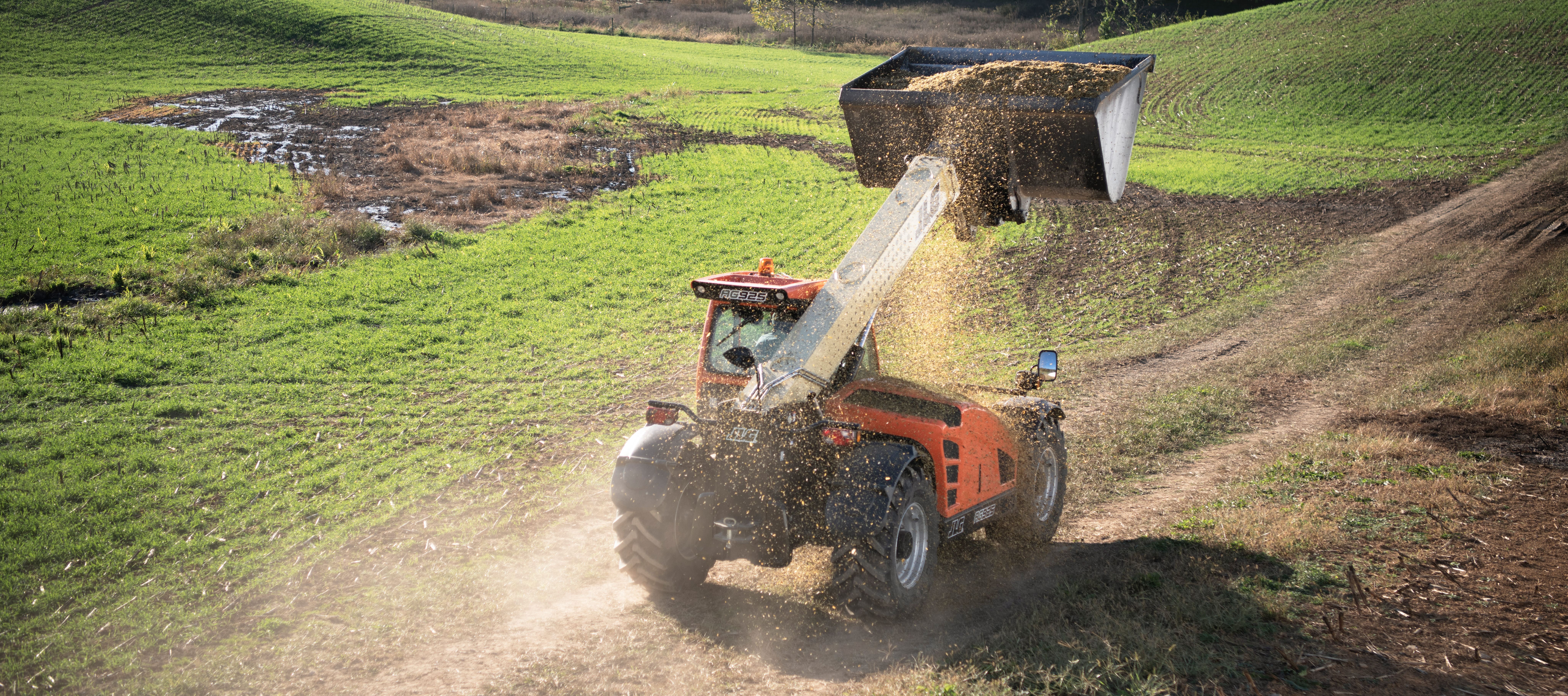 JLG Telehandler outside in a farm field