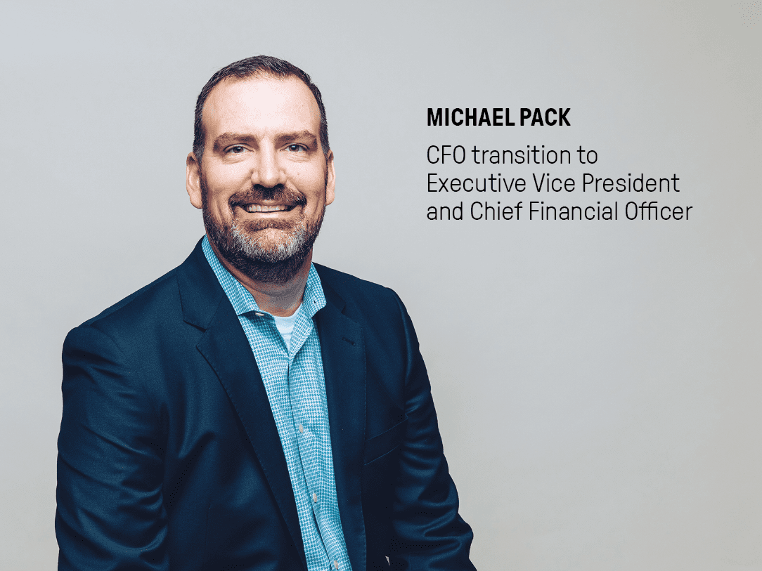 Executive Vice President and Chief Financial Officer, Michael Pack, on a grey background