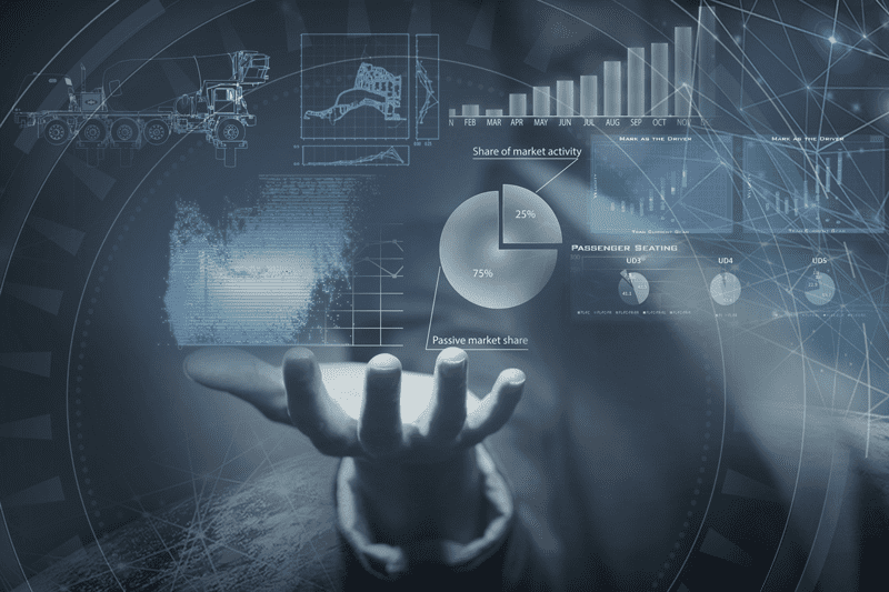 Advanced Analytics graphic with a hand holding up graphical elements 